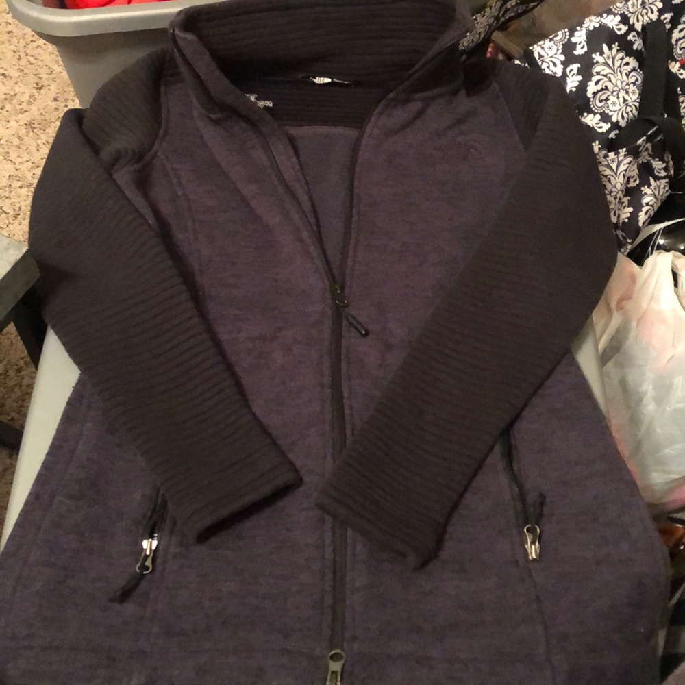The North Face black zip-up hooded lightweight jacket